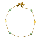 Fine gold chain necklace with mint-green chalcedony stones and brushed gold ovals, laid in a circle