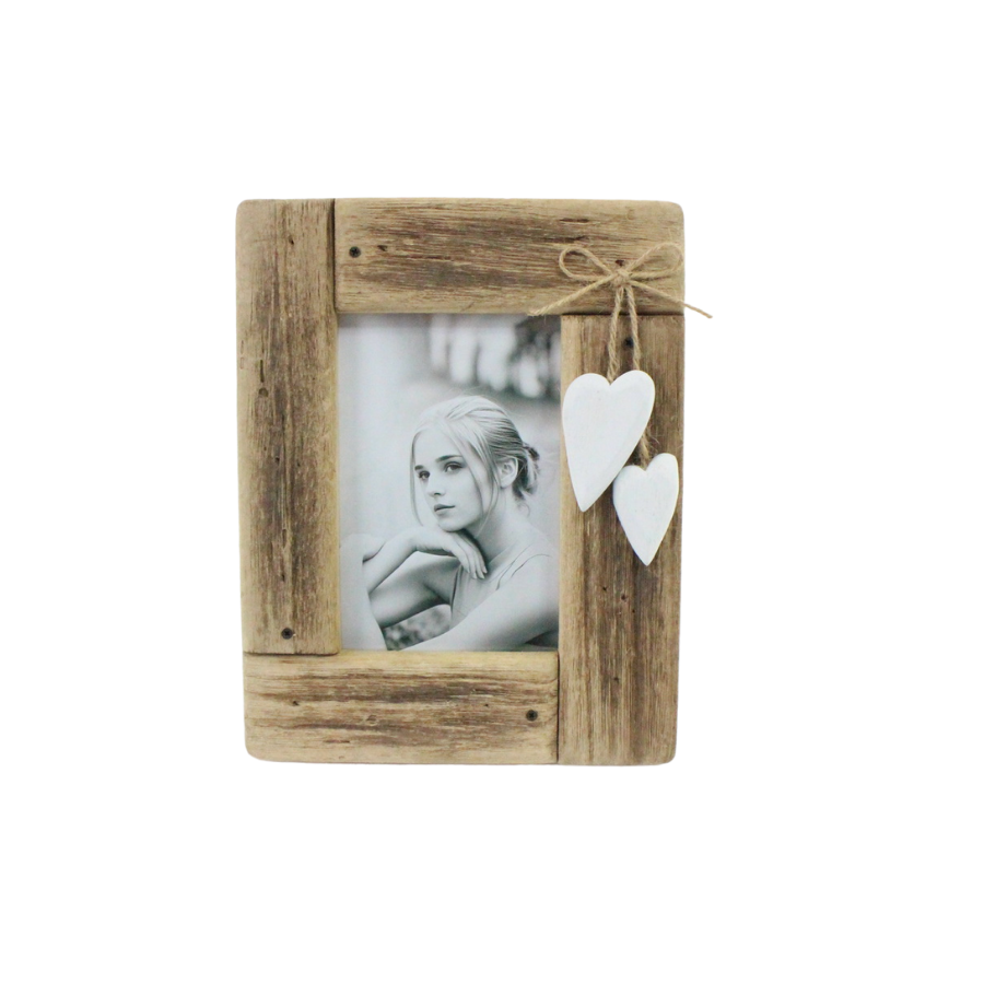 Rustic light timber photo frame holding a black and white portrait, with two small white wooden hearts tied to the right-hand side on twine.