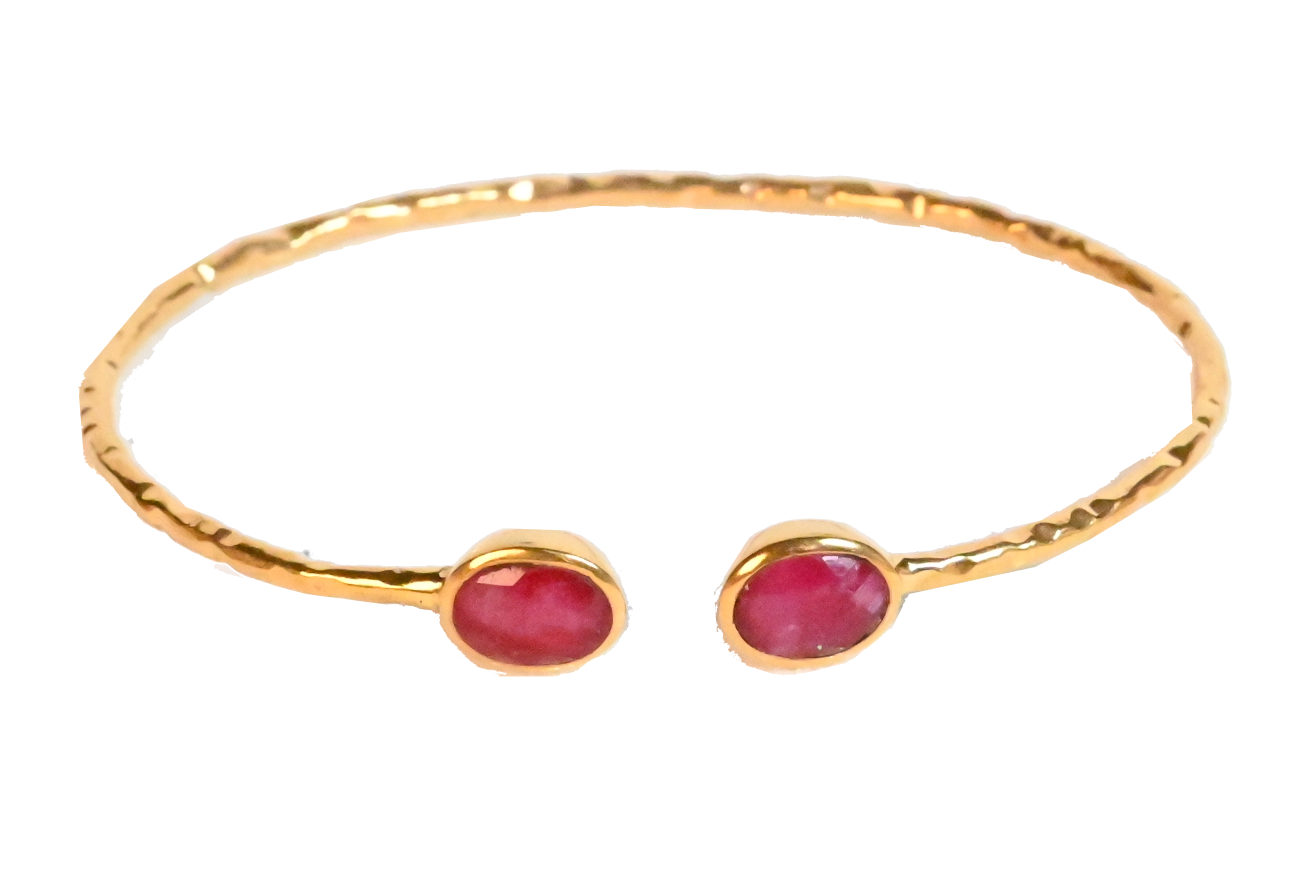 Euro Gold cuff bangle with two ruby-red gems on black background