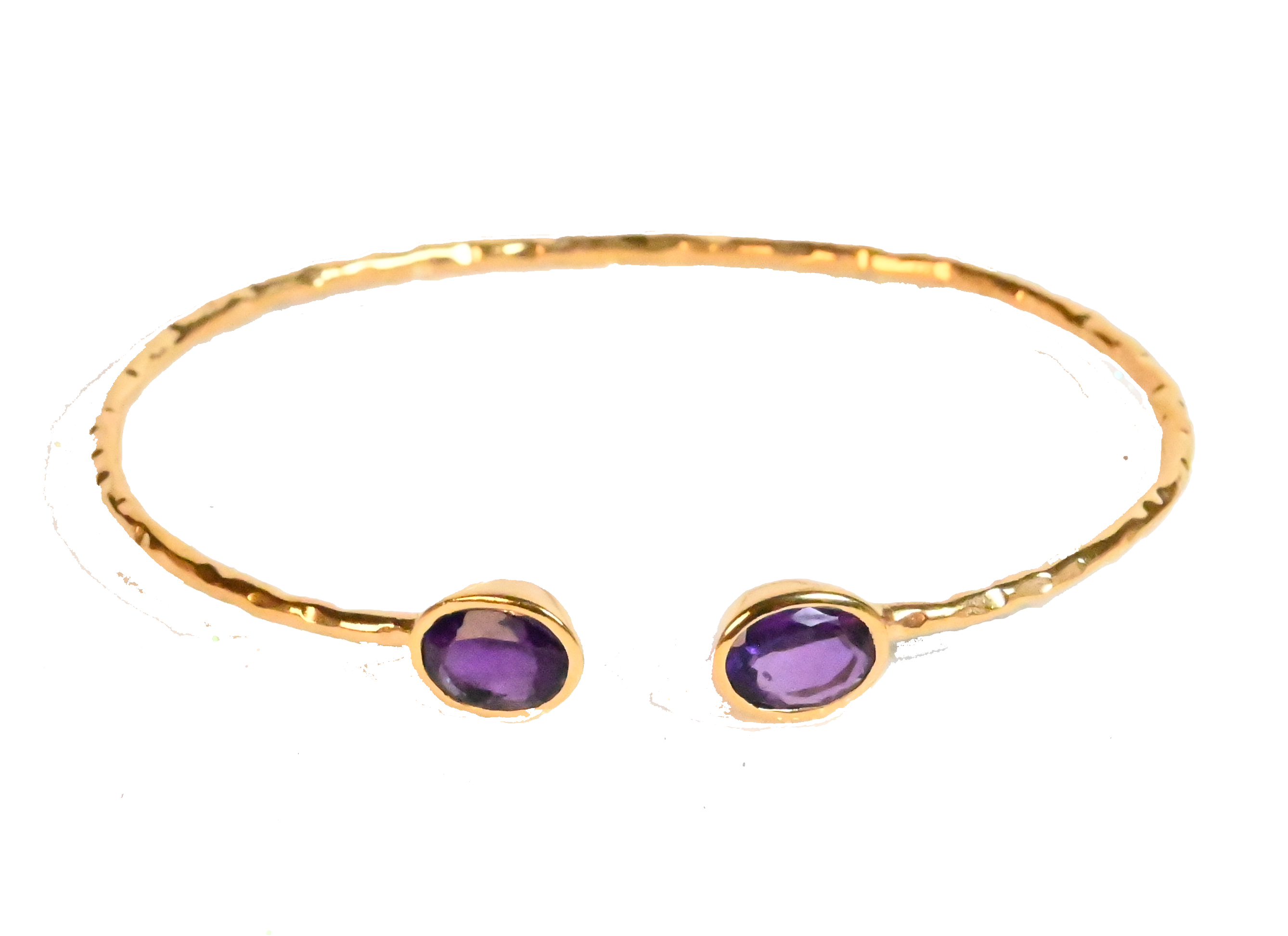 Euro Gold cuff bangle with two amethyst-purple gems on black background
