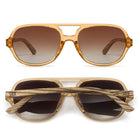 Two pairs of Billy sunglasses in translucent brown, one front-on and one folded, showing the striped wood arms