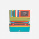 Pacific purse open, showing rainbow card slots, a coral ID window and coral note sections