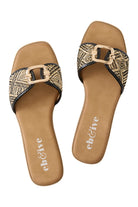 Pair of Treville Sandals in Black: woven strap slides with gold buckle