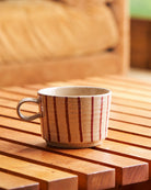 Archive mug in Sway on a slatted timber table