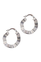 Pair of silver Himba Scallop Hoops with rippled texture