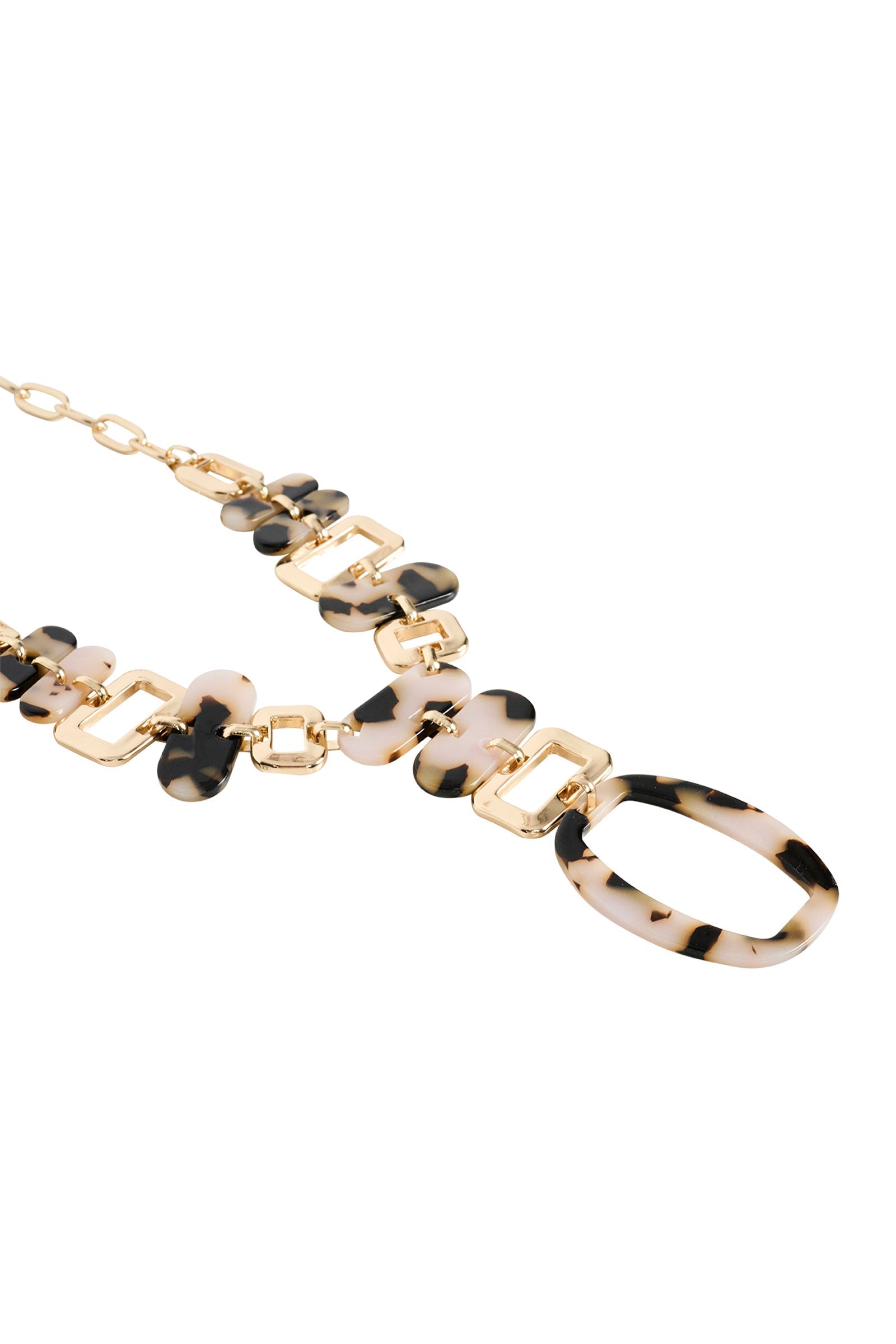 Close-up of tortoiseshell resin beads on the gold chain