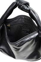 Open black Zala Bag showing the interior zip pocket