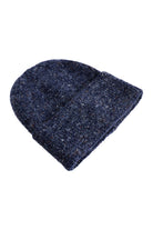 Side view of the folded denim-blue Zarda Beanie