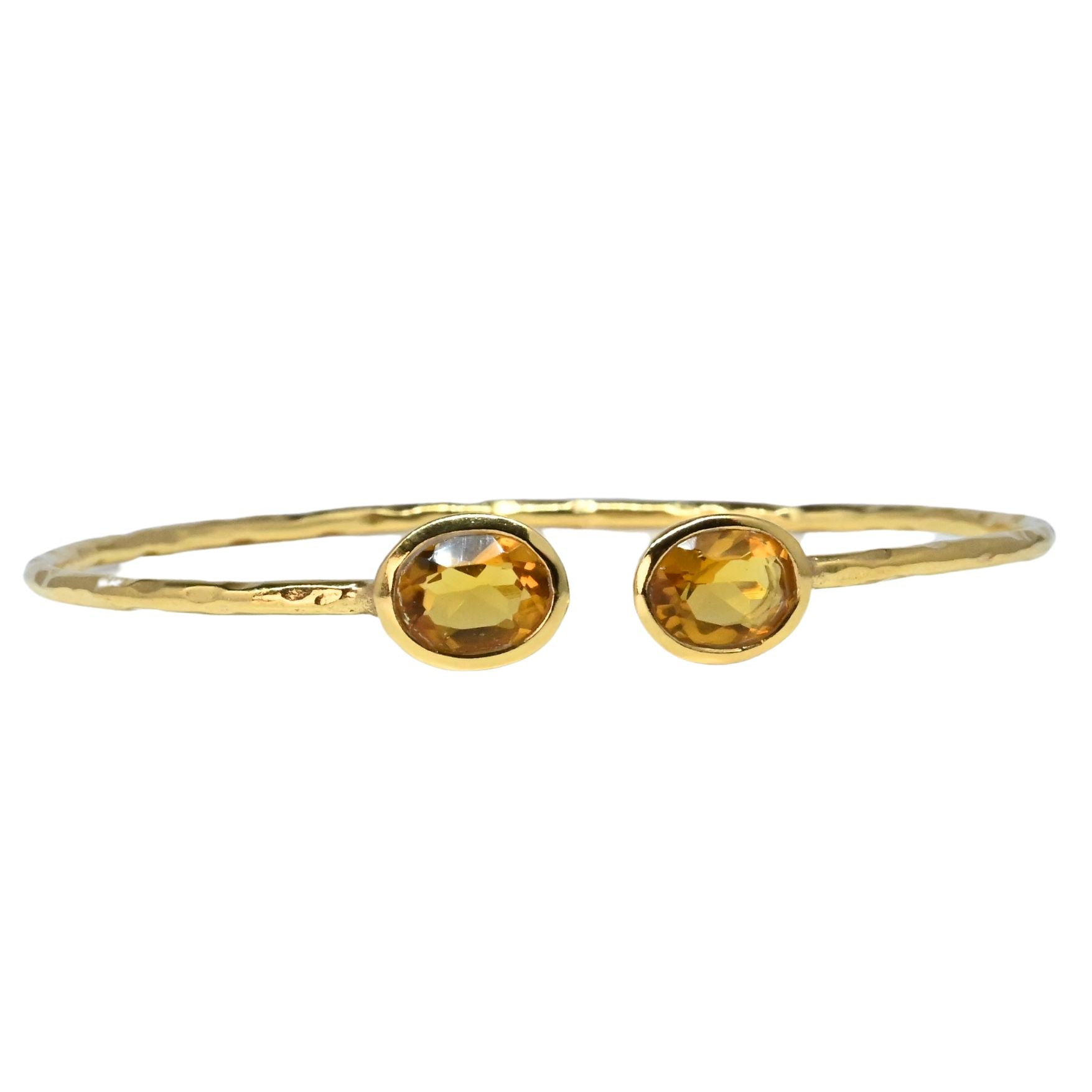 Euro Gold cuff bangle with two golden citrine gems, hammered band