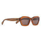 Three-quarter view of the Stray sunglasses in Coffee Bean with striped walnut wood arms
