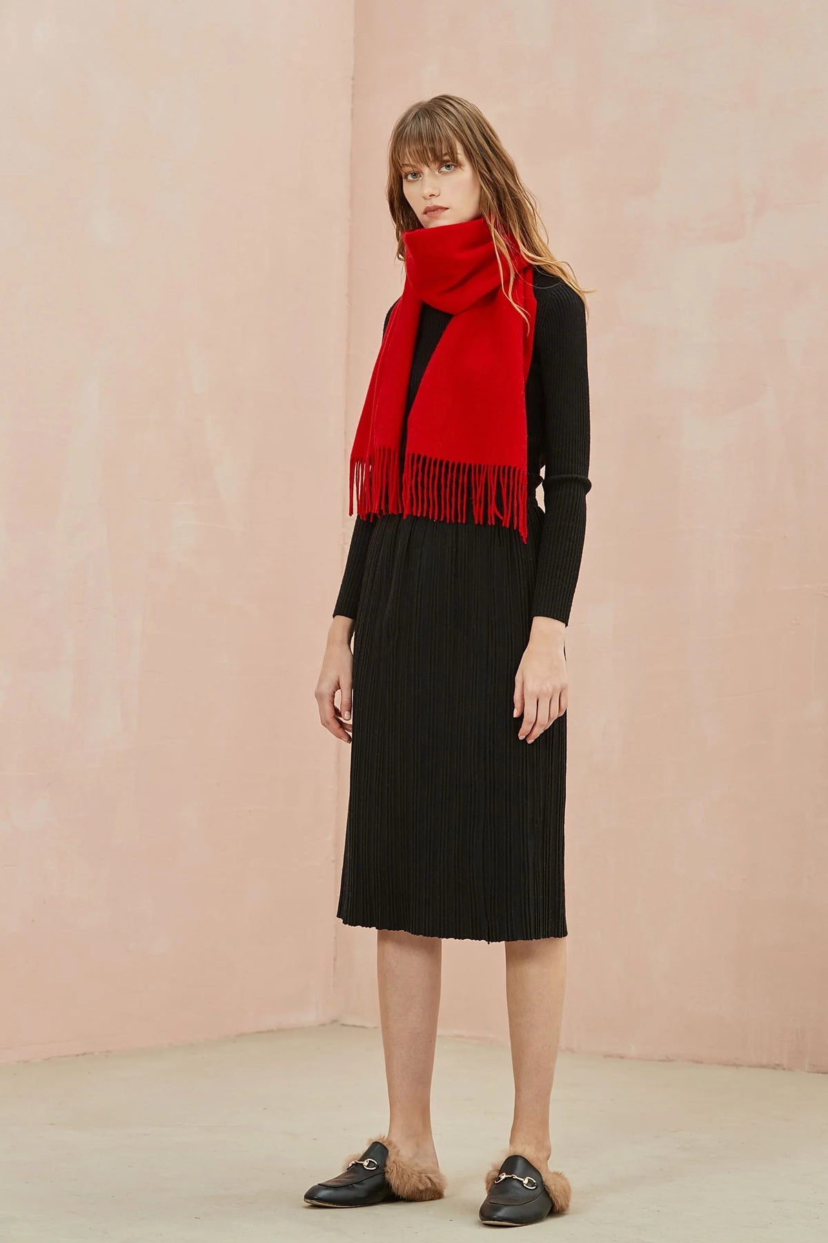 Full-length black outfit with the Raving Red scarf draped down the front