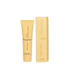 Small yellow tube of Lily & Cotton Flower hand cream beside its matching carton.