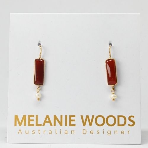 Euro Gold earrings with rich red carnelian bars and freshwater pearl drops, on Melanie Woods designer card
