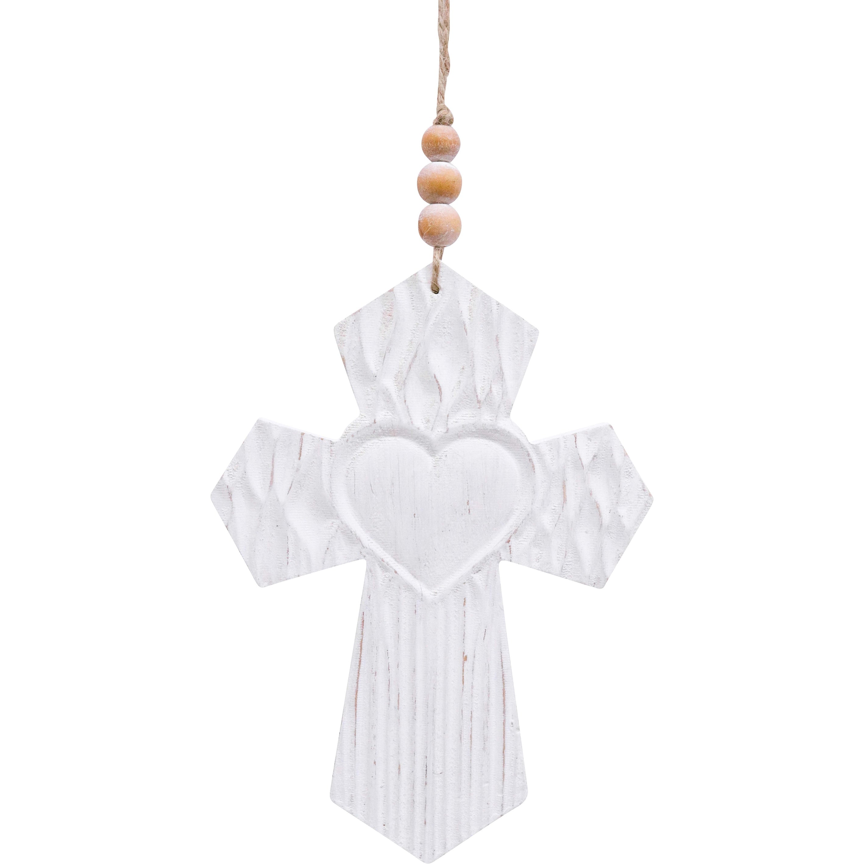 White-washed timber cross with a carved heart centre, hung from rustic twine with three wooden beads