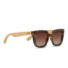 Soluna sunglasses at an angle, showing the pale maple wood arms