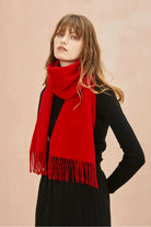 Side pose with the Raving Red merino scarf and fringed ends