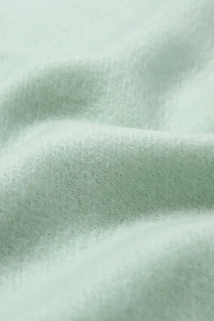 Texture close-up of the Pistachio mint merino