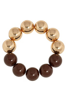 Bracelet of large round beads, gold-tone along the top and toffee brown along the bottom