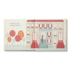 Open spread of a figure outside a pink townhouse with the words you bloom with courage and grace