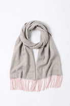 Quartz Pink merino scarf looped flat, grey body with pink fringe