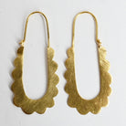 Brushed gold long U-shaped hoop earrings with a scalloped edge and a fine wire top
