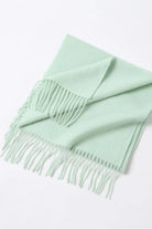 Pistachio scarf folded flat with fringe