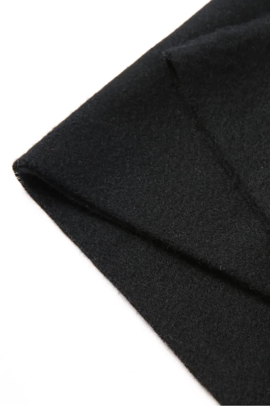Fold edge detail of the Ebony black scarf