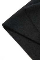 Fold edge detail of the Ebony black scarf