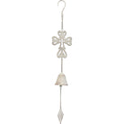 White-washed metal hanging bell with an ornate cross top, chain hanger and diamond-shaped clapper charm