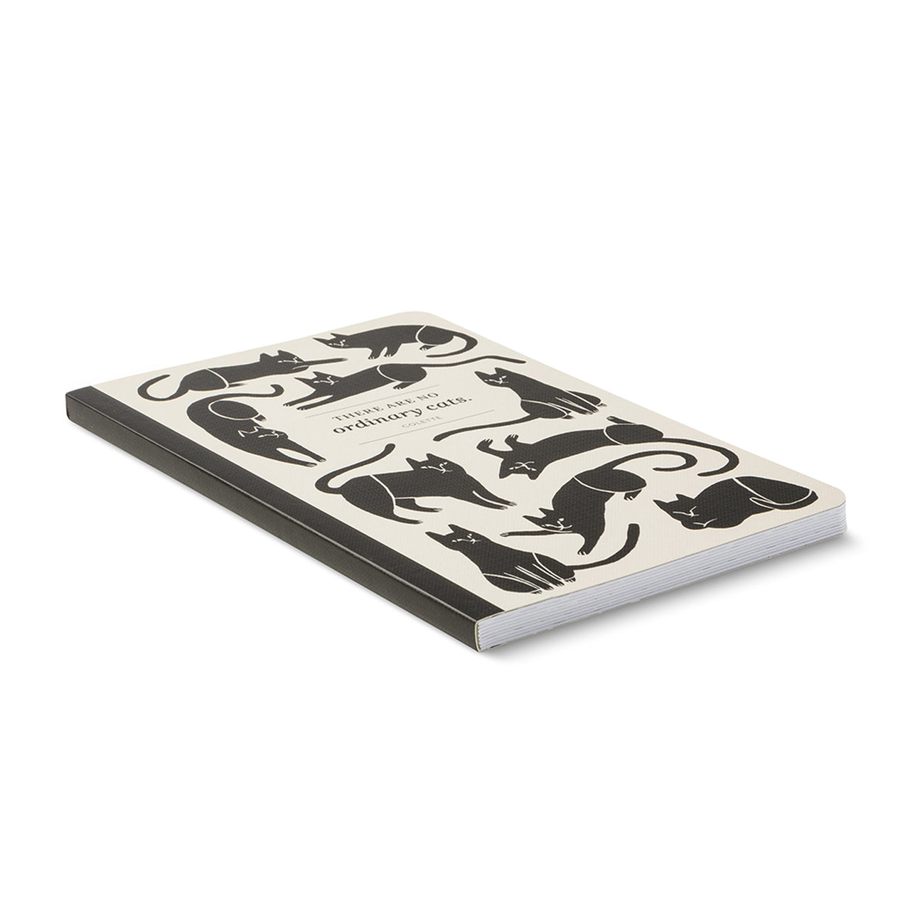 Angled view of the cat-patterned softcover journal lying closed