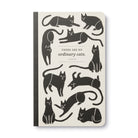 Cream journal cover patterned with black cat silhouettes above the words there are no ordinary cats