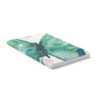 Angled view of the watercolour butterfly softcover lying flat