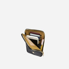 Navy phone pouch unzipped showing cards, cash and phone