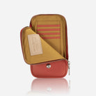 Apricot phone pouch open showing leather card slots and branded patch