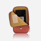 Apricot phone pouch with flap open showing phone inside and golden lining