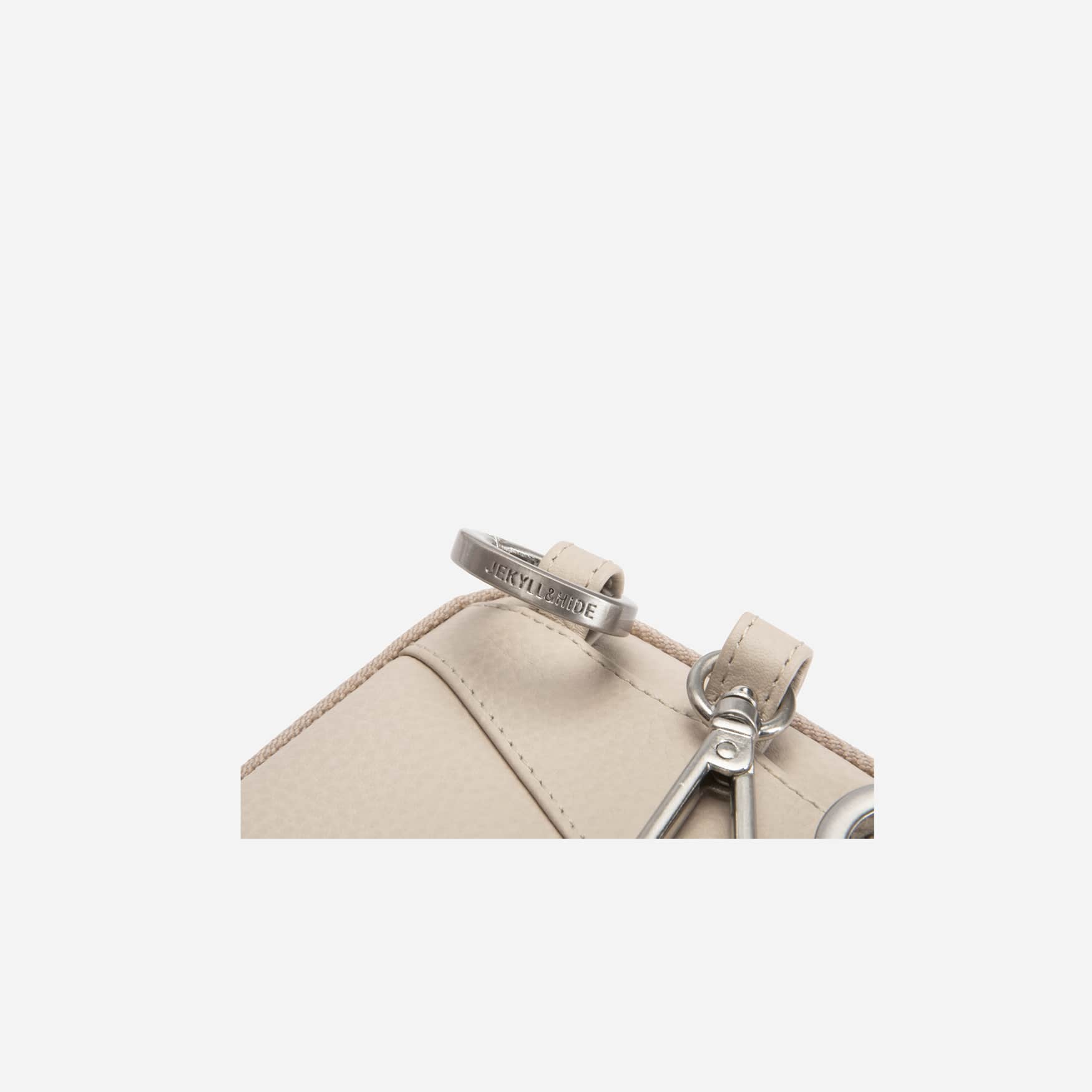 Corner close-up of the driftwood pouch clip hardware
