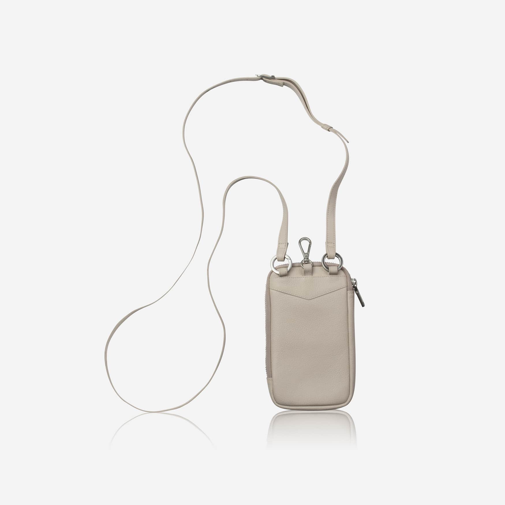 Driftwood stone leather phone pouch hanging from its crossbody strap