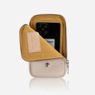 Driftwood pouch with flap open showing phone and stud closure