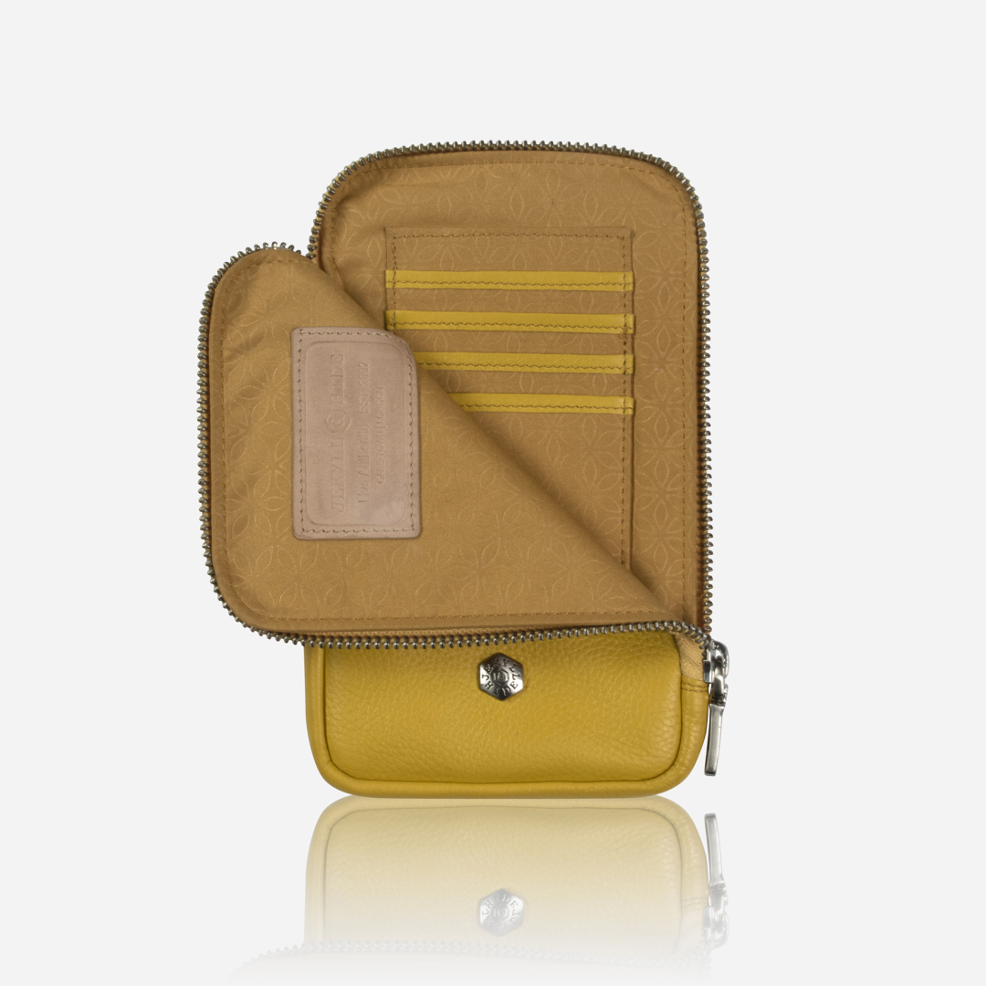 Yellow phone pouch with flap open showing card slots and branded patch