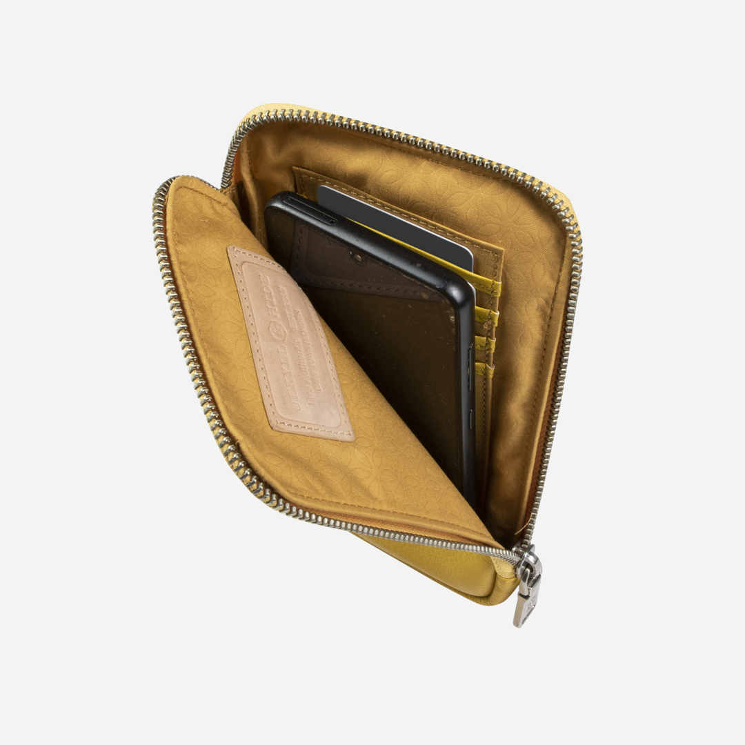 Yellow phone pouch unzipped showing card slots and tablet pocket