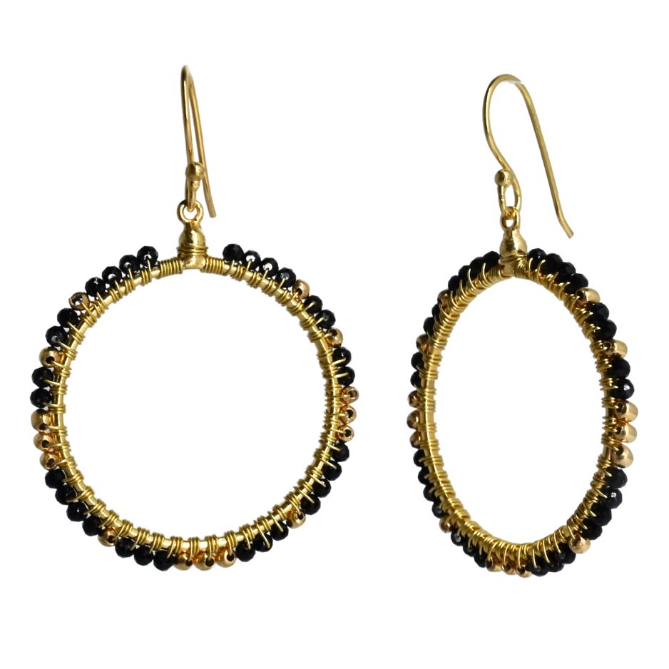 Gold hoop earrings wire-wrapped with black onyx beads