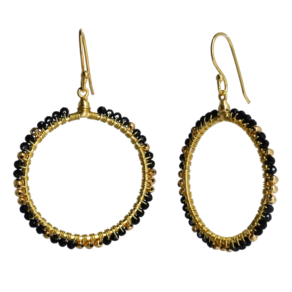 Gold hoop earrings wire-wrapped with black onyx beads