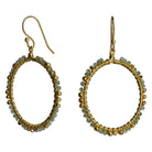 Gold hoop earrings wire-wrapped with pale sage-green peridot beads