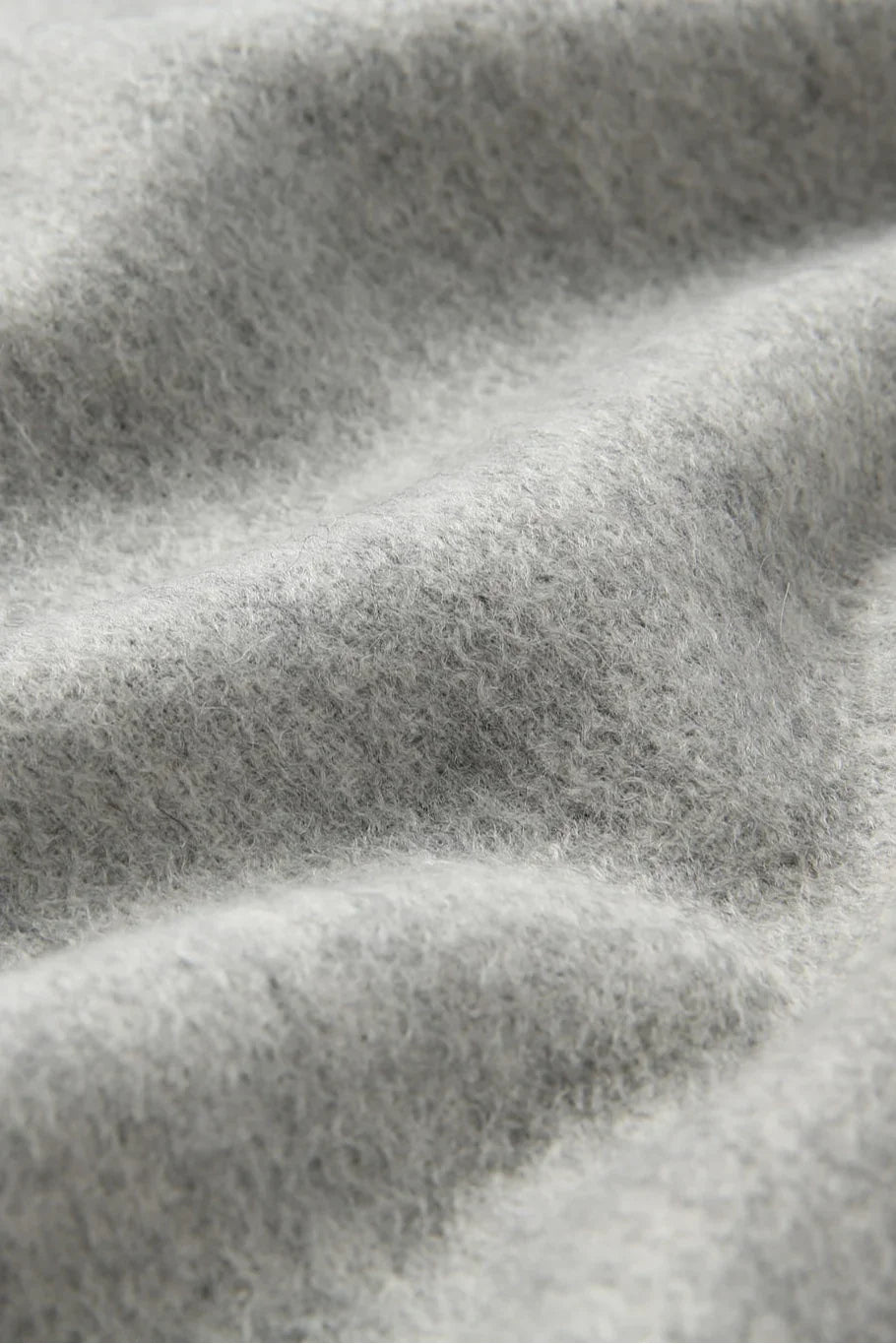 Texture close-up of the Quartz light grey merino