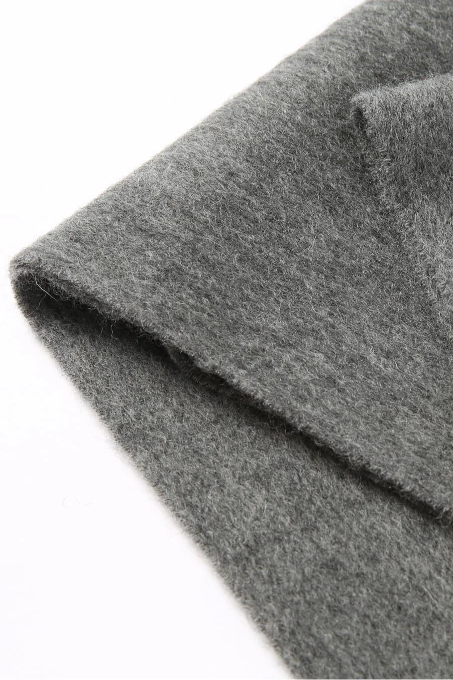 Fold edge detail of the Light Charcoal grey scarf