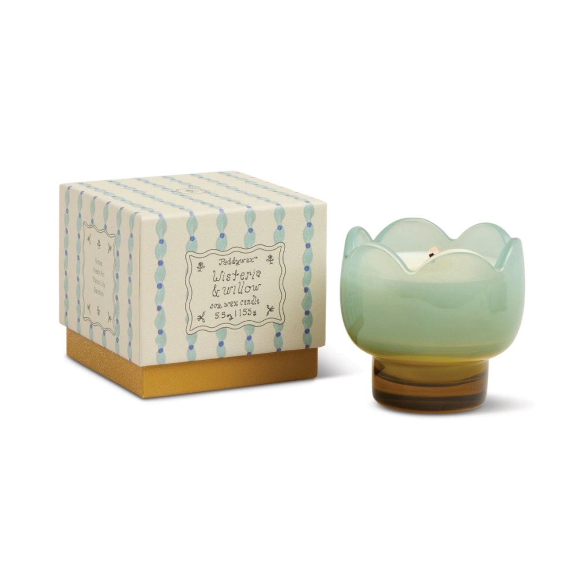 Pale mint tulip-shaped glass candle beside its cream and blue striped gift box.
