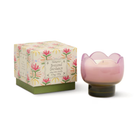 Pink tulip-shaped glass candle on a smoky olive base, beside its cream gift box printed with pink flowers.