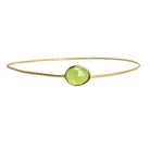 Euro Gold cuff bangle with a faceted lime-green quartz