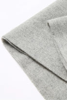 Fold edge detail of the light grey Quartz merino