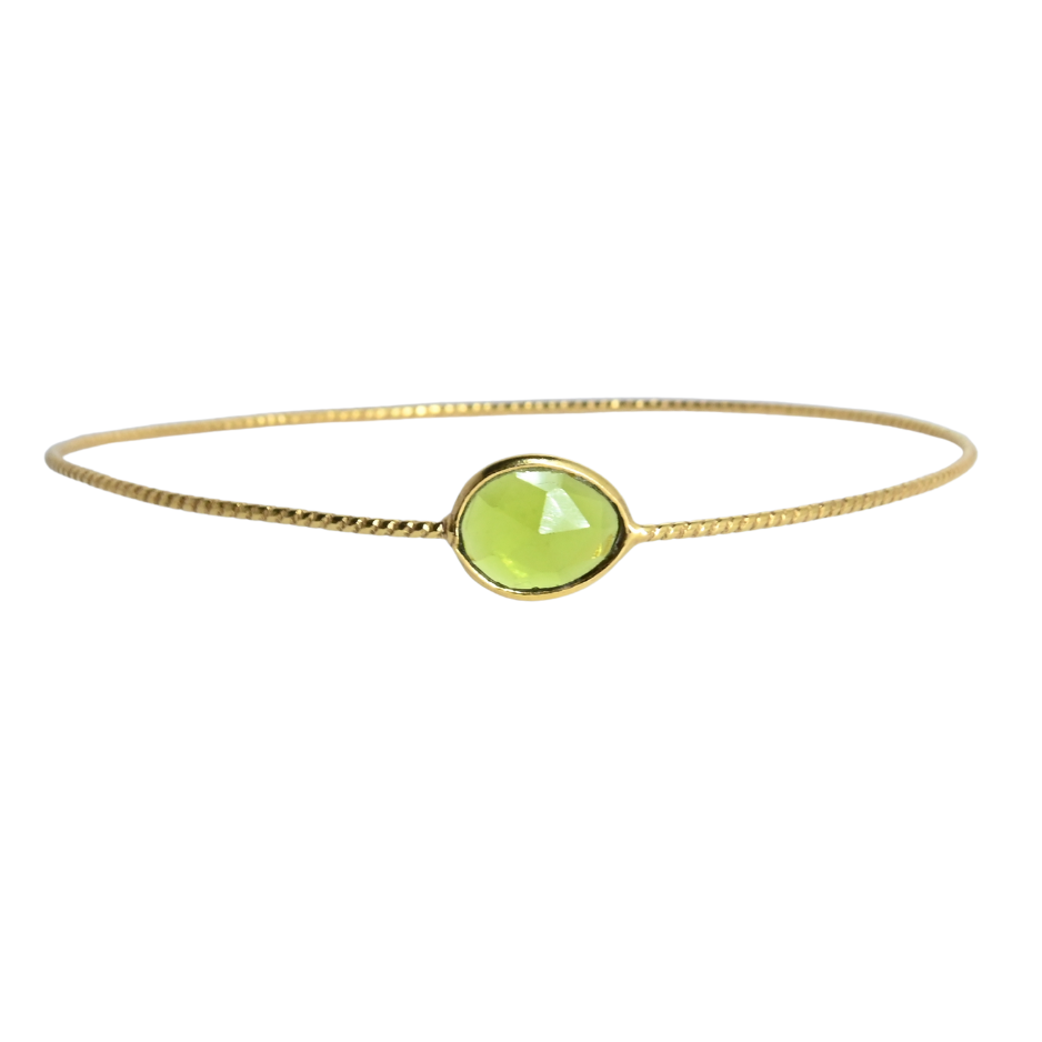 Euro Gold cuff bangle with a faceted lime-green quartz